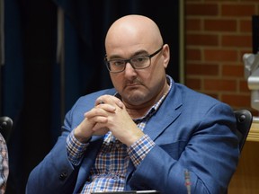 Councillor Lance Bussieres listens during a council meeting at city hall in Fort McMurray on Tuesday, March 28, 2017. Cullen Bird/Fort McMurray Today/Postmedia Network.