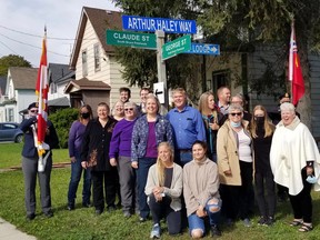Family members of Arthur Haley gathered under the new sign which proclaims Claude Street is now also known as Arthur Haley Way, on Sunday, Sept. 26, 2021 in Wiarton, Ont. (Scott Dunn/The Sun Times/Postmedia Network)
