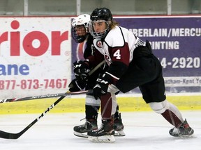 Chatham Maroons' Colin Whaley (4) checks LaSalle Vipers' Lee Knight (17) in a GOJHL pre-season game at Chatham Memorial Arena in Chatham, Ont., on Sunday, Sept. 12, 2021. Mark Malone/Chatham Daily News/Postmedia Network