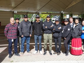 From left to right: Kenora Makwa Patrol manager Marshall Hardy, Wauzhushk Onigum Chief Chris Skead, patrollers Jeremiah Macdonald, Dalton Wesley, Makwa Goodsky, Garnet Ross, and Brianne Mousseaux, Kenora Chiefs Advisory executive Director Joe Barnes, Director of Community Health and Cultural Services Veronica Fobister, and Niisaachewan Chief Lorraine Cobiness.