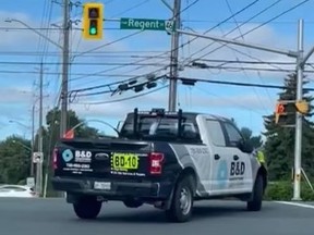 Police are trying to stop the driver of this Ford F-150, Ontario Licence plate number of AY70909. The truck is white and black with B&D Manufacturing decals, police said.