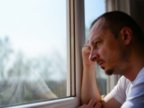 A man ponders leaving his wife for another woman.