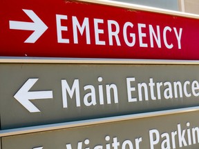 Emergency department and hospital entrance signage.