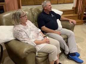 Conservative candidate for Chatham-Kent-Leamington, Dave Epp, and his wife Charlene watch the 2021 federal election results Monday from their Leamington-area home. Epp, who won the riding in 2019 to become a first-time MP, is seeking re-election. (Submitted photo)
