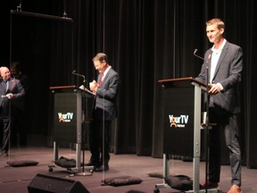 Steven Trahan, left, Anthony Rota and Scott Robertson face off in a debate Tuesday night at the Capitol Centre in North Bay.
PJ Wilson/The Nugget