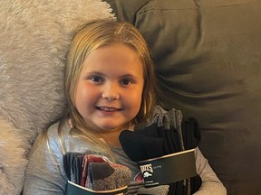 Kyliegh Janes, 8, has already collected hundreds of pairs of socks to warm the feet of the homeless and disadvantaged as part of her own personal Socktober event.