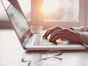 Man using laptop computer