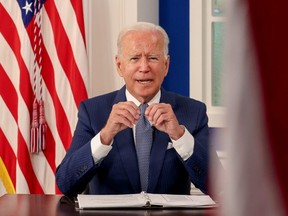 U.S. President Joe Biden hosts a virtual coronavirus disease (COVID-19) Summit as part of the United Nations General Assembly (UNGA) from the White House in Washington, U.S., September 22, 2021. (REUTERS/Evelyn Hockstein)