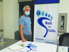 Walk the Talks booth led by an active member of the initiative, Alan Vowles at the Devon Community Awareness Night. KAJAL DHANESHWARI