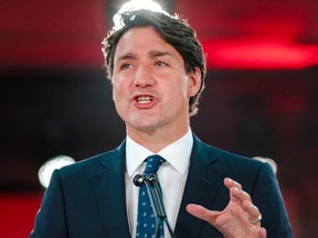 Canadian Prime Minister Justin Trudeau delivers his victory speech after general elections at the Queen Elizabeth Hotel in Montreal, Quebec, early on September 21, 2021.