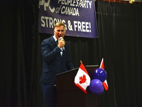 PPC leader Maxime Bernier makes a speech to a crowd of his supporters at the Lion's Club Events Centre in Cochrane on August 30. Photo by Riley Cassidy/The Airdrie Echo/Postmedia Network Inc.