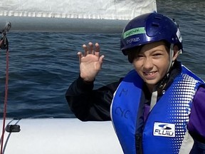 Navy League cadet Toby Lypchuk, age 11, prepares to set sail Lake Chestermere. Photo courtesy of Navy League Cadets