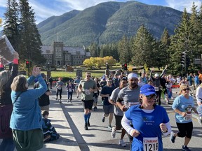 The Melissa Race welcomed 3,000 runners back for the 42th Melissa's Road Race in Banff on Saturday, Sept. 25. The participants, including many locals from the Bow Valley, were excited for the return of the famous race. (Pictured) Runners in the five kilometre and 10 km distances race over the Banff bridge. Photo Marie Conboy/ Postmedia.