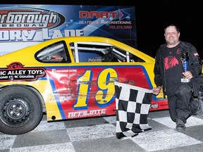 Winning the main event led to clinching the 2021 Battlefield Equipment Rental Bone Stock track championship for Shawn Solomon (No. 19) Saturday at Peterborough Speedway. MELISSA SMITS PHOTO