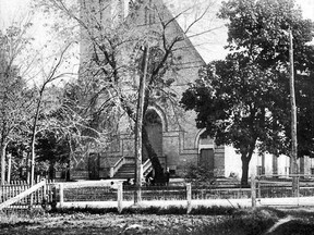 St. AndrewÕs Presbyterian Church Norwood was built in 1878, the same year the town of Norwood was incorporated. Although now lost due to a necessary restoration in the 1970Õs, the steeple at one time featured a few unique architectural elements as shown in this picture taken around 1920. On might also notice the very courageous individual on a ladder adjusting the cross at the top of the spire. SUBMITTED PHOTO