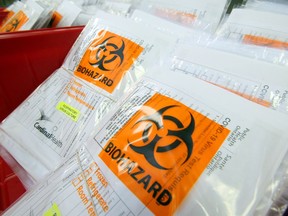 Testing kits for COVID-19 testing kit lie in bins Tuesday, Aug. 25, 2020 in the medical microbiology laboratory of Belleville General Hospital in Belleville, Ont. Luke Hendry/The  Intelligencer/Postmedia Network
