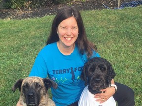 Velika Kitchen-Janzen, chair of the Brantford Terry Fox Run committee, gets ready for run day with her dogs, Revy and Wally.