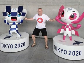 Ed Zinger, a physical education teacher at W. Ross Macdonald School in Brantford, recently returned from the Tokyo Summer Olympics, at which he was a wrestling official.
