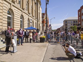 Brantford mayor Kevin Davis (left) speaks during ceremonies on Saturday September 18, 2021 marking the grand opening of the new city hall in Brantford, Ontario.