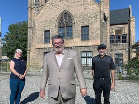 Kelly Bernstein (left), Brant County Library CEO, Brant Mayor David Bailey and Fred Gladding, chair of the Brant County Library board, in front of the Bawcutt Centre in Paris, which will become the new home of the Paris library.