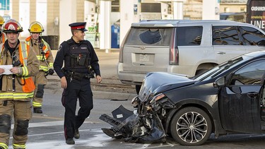 A 2018 photo shows Brantford police and firefighters responding to a two-vehicle crash at Dalhousie and Clarence streets, the top spot for collisions in the city. Expositor file photo