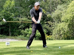 Mitch Beattie tees off on the first hole of the Friends of Palliative Care Golf Days on Tuesday. (MARSHALL HEALEY/The Recorder and Times)