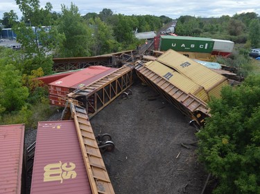 Heavy machinery had started arriving by late Thursday afternoon as crews prepared to begin the task of removing derailed cars just west of the Edward Street overpass in Prescott. 
Tim Ruhnke/The Recorder and Times