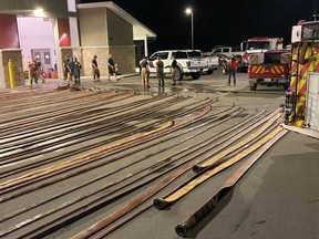 Augusta firefighters clean the many hoses used during a fire call near Stones Corners on Tuesday.
Submitted photo/The Recorder and Times