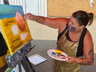 Christine Sloan conducts a painting session for youngsters in front of the Poultry Barn at the 2021 Spencerville Fair.
Tim Ruhnke/The Recorder and Times