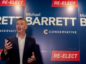 Re-elected Conservative MP Michael Barrett speaks with the press shortly after his win in Leeds-Grenville-Thousand Islands and Rideau Lakes.
