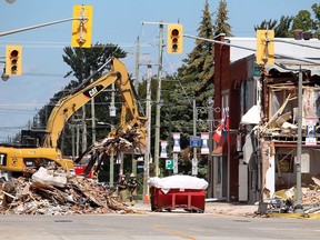 Workers were busy Wednesday cleaning up debris from an explosion that rocked downtown Wheatley on Aug. 26. Chatham-Kent officials report the debris should be cleaned up by the end of the week, facilitating efforts to find the source of a hydrogen sulphide leak suspected of causing the blast. (Ellwood Shreve/Chatham Daily News)