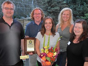 The Rotary Club of Mitchell, represented by current president Bert Vorstenbosch, Jr. (left), Joan DIxon and Carol McClure (right), presented the 2020 Citizen of the Year recognition to Mitchell residents Dean and Alison Smith. ANDY BADER/MITCHELL ADVOCATE