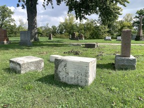 Several monuments were damaged after a powerful storm recently swept through the Dresden Cemetery last Sunday night. Peter Epp/Postmedia Network