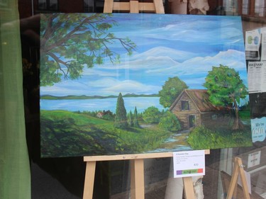 A Summer Day, acrylic on canvas, by Susan Irving, on display in the Town & Country Flowers storefront window. Photo on Saturday, September 11, 2021, in Alexandria, Ont. Todd Hambleton/Cornwall Standard-Freeholder/Postmedia Network