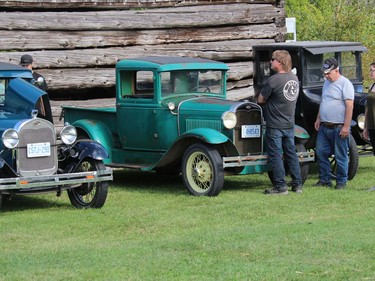 Checking out some vintage vehicles at the Harvest Festival. Photo on Sunday, September 12, in Dunvegan, Ont. Todd Hambleton/Cornwall Standard-Freeholder/Postmedia Network