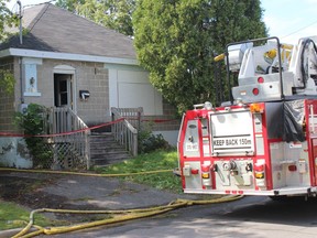 The Cornwall Fire Service was still on scene at a home on Gloucester St. in early afternoon on Sunday. Todd Hambleton/Cornwall Standard-Freeholder/Postmedia Network