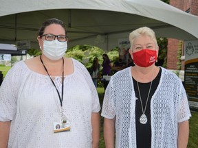 From left, Tri-County Literacy Centre (TCLC) administrative assistant Carolyn Eva and executive director Dina McGowan at the International Literacy Day and National Truck Driver Appreciation Day event Saturday September 18, 2021 in Cornwall, Ont. Shawna O'Neill/Cornwall Standard-Freeholder/Postmedia Network