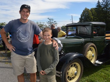 Craig and William Stevenson enjoying the classic cars at the third annual Iroquois Apple Festival on Saturday September 18, 2021 in Iroquois, Ont. Shawna O'Neill/Cornwall Standard-Freeholder/Postmedia Network