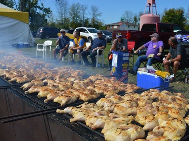 Volunteers cooking 700 chickens for those in attendance of the Iroquois Apple Festival on Saturday September 18, 2021 in Iroquois, Ont. Shawna O'Neill/Cornwall Standard-Freeholder/Postmedia Network