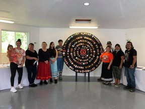 Some of the artists at the exhibit at the Native North American Travelling College in Akwesasne, the We Were Children  Shiiakwakssha’okon:a display. Handout/Cornwall Standard-Freeholder/Postmedia Network