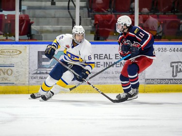 The Cornwall Colts Anastasios Lazaris crosses paths with Carleton Place Canadians Kerfalla Toure during play on Thursday September 23, 2021 in Cornwall, Ont. Cornwall lost 4-3 in a shootout. Robert Lefebvre/Special to the Cornwall Standard-Freeholder/Postmedia Network