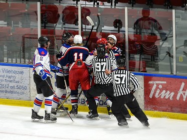 Linesmen rush towards a Cornwall Colts and Rockland Nationals players scrum after the whistle during exhibition play on Thursday September 16, 2021 in Cornwall, Ont. Cornwall won 2-1. Robert Lefebvre/Special to the Cornwall Standard-Freeholder/Postmedia Network