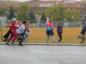 Should the town and county decide to get on board financially, the field between Cochrane High, Manachaban and Elizabeth Barrett might be upgraded with artificial turf that could accommodate football games. Patrick Gibson/Cochrane Times