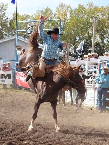 The Hanna Indoor Pro Rodeo drew a decent sized crowd as people cheered on riders in a variety of events including Bronc Riding at the Hand Hills Lake Stampede Grounds. The event was moved to the outdoor location due to COVID-19 health restrictions. Jackie Irwin/Postmedia