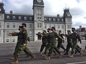 Aboriginal Leadership Opportunity Year students march on the Royal Military College parade square prior to the start of the ALOY cap badge ceremony in Kingston on Friday.