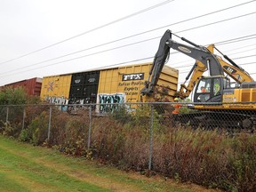 A work crew on the scene of a train derailment on the Canadian National main line just north of Amherstview's Willie Pratt Sports Fields on Wednesday.