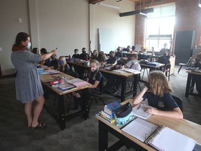 Emma Gibson-Bray teaches Grade 7 students at Leahurst College in Kingston's Woolen Mill in the former newsroom of The Kingston Whig-Standard newspaper, which occupied the space from 1997 to December 2020.