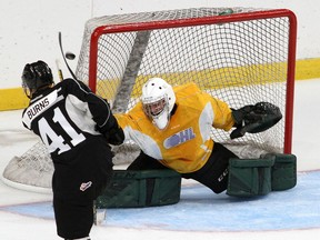 Kingston Frontenacs rookie defenceman Quinton Burns shoots wide on rookie goaltender Mason Vaccari during a scrimmage at the Leon's Centre on Wednesday Sept. 1.