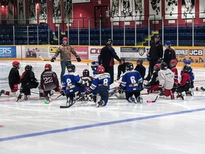 A minor hockey practice is held at the Joe Mavrinac Community Complex.