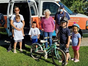 The annual walk down Adare Road in North Middlesex recently raised more than $3,000 for VON Middlesex-Elgin. Pictured from left are Shelly Wells Prtenjaca with her son Sam, Canaon Babbage, Donelda Lewis, VON van driver Richard Bolton and Tim and Claire Morrissey. Handout